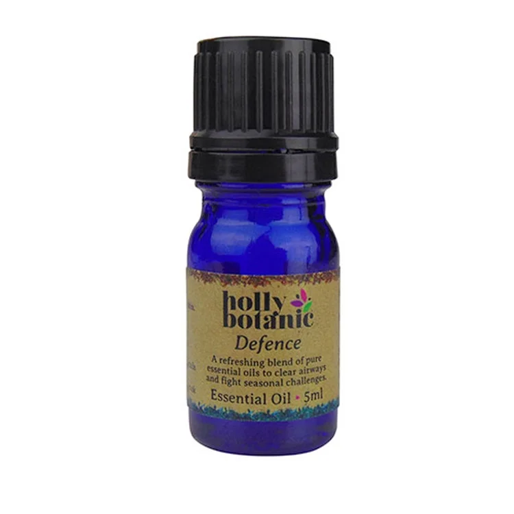 Holly Botanic defence essential oil blend product image. 5ml blue glass, recyclable dropper bottle.